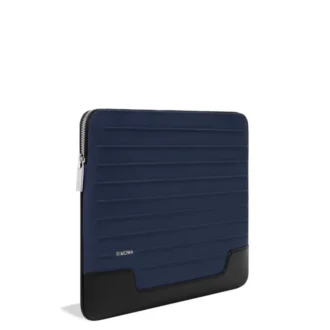 Bolso tipo cubo plano de cuero y lona