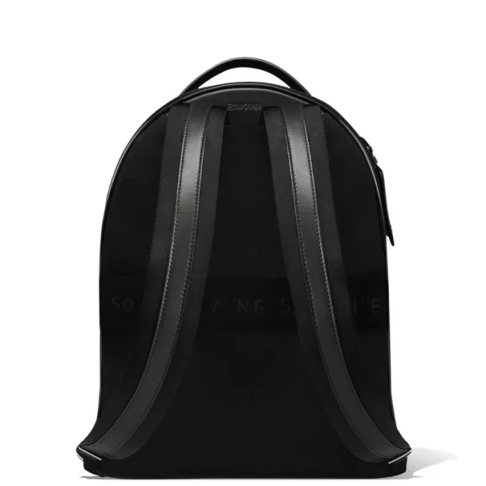 Mochila mediana de cuero y lona Mochila mediana de cuero y lona