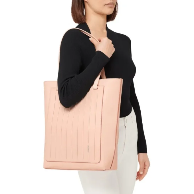 Never Still Vertical en cuero y lona TrageBags Never Still Vertical en cuero y lona TrageBags